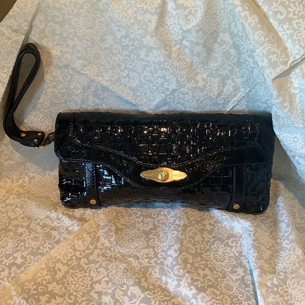 Elliott Lucca black leather clutch w/gold accents